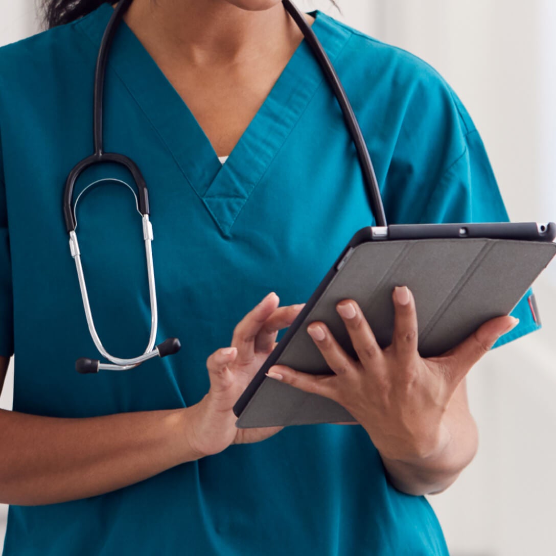  doctor using tablet in hands