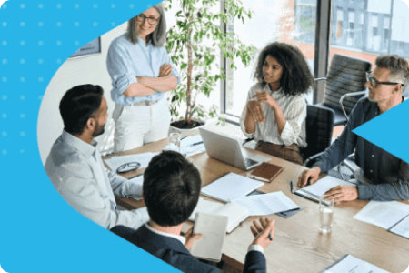 People collaborating around a meeting table
