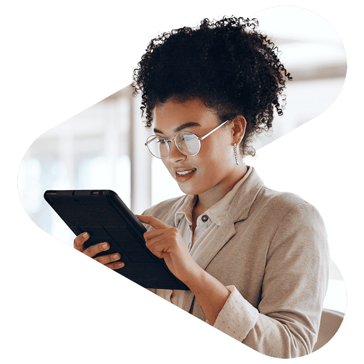 woman using tablet wearing glasses logo